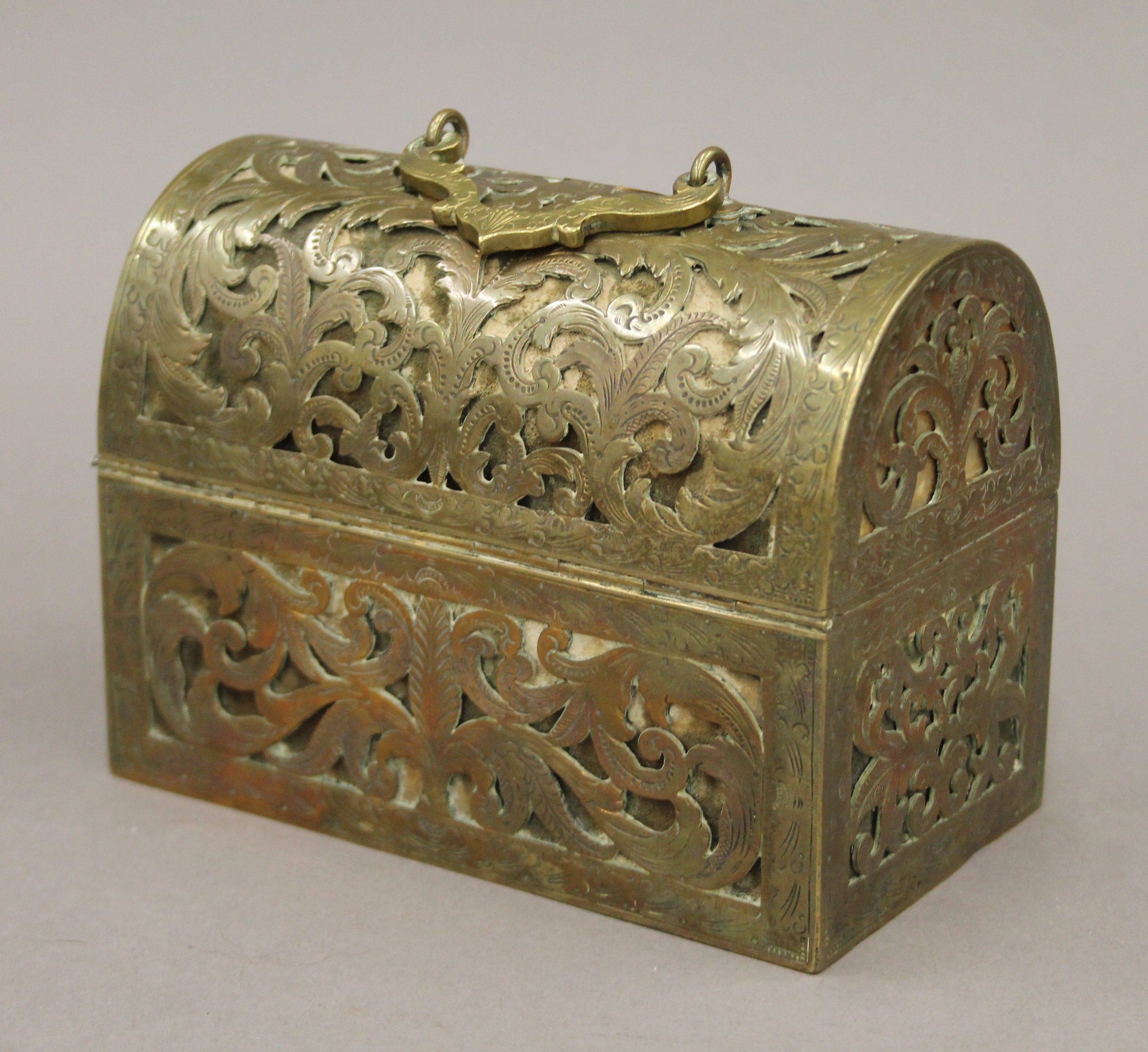 An antique dome-shaped pierced brass velvet-lined perfume casket containing three gilded cut glass - Image 6 of 6