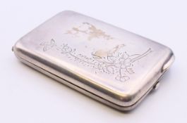 A Russian silver cigarette case. 9 cm x 6 cm high. 104.5 grammes.