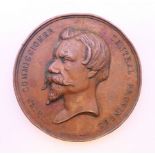 A Victorian industrial revolution medallion. 5 cm diameter.