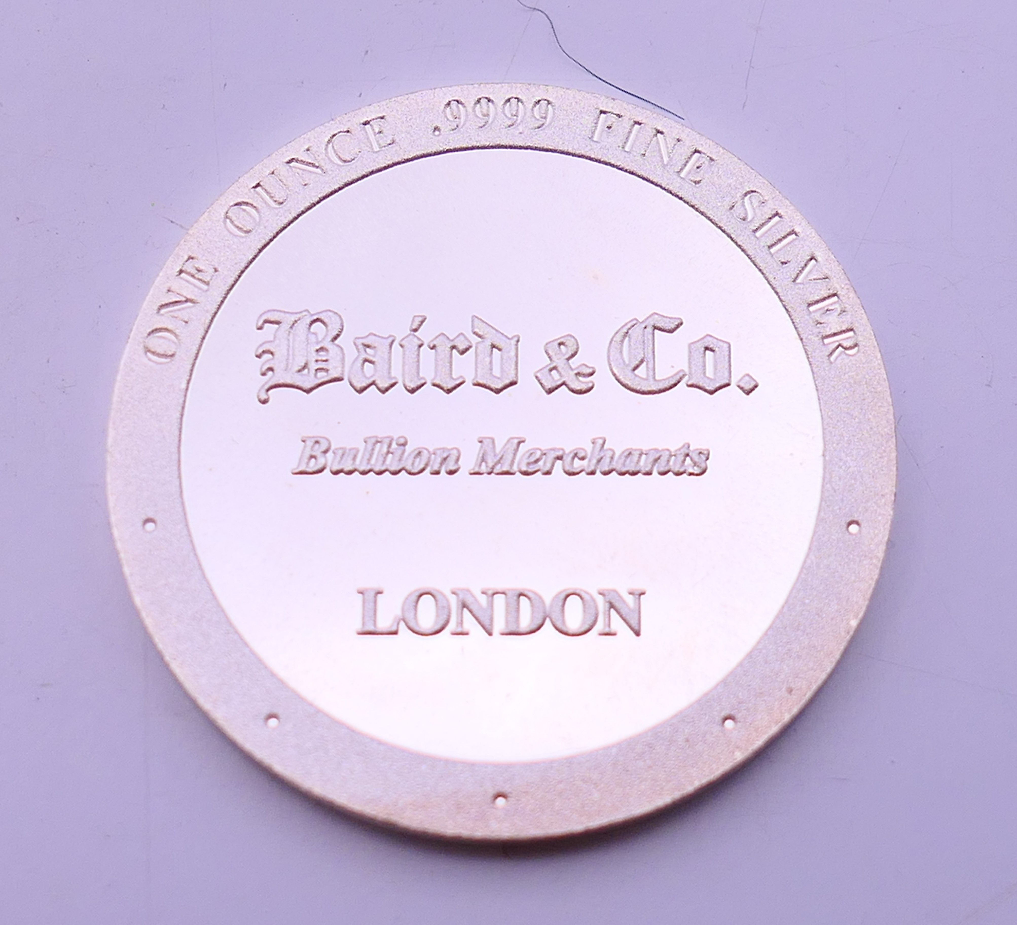 A .999 fine silver one ounce peregrine falcon coin. 4 cm diameter. - Image 3 of 4