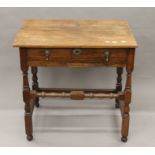 An 18th century oak single-drawer side table. 74.5 cm wide.