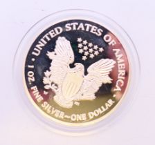 A 2016 one ounce fine silver USA one dollar coin.