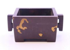 A bronze rectangular gold splash censer. 3 cm high.