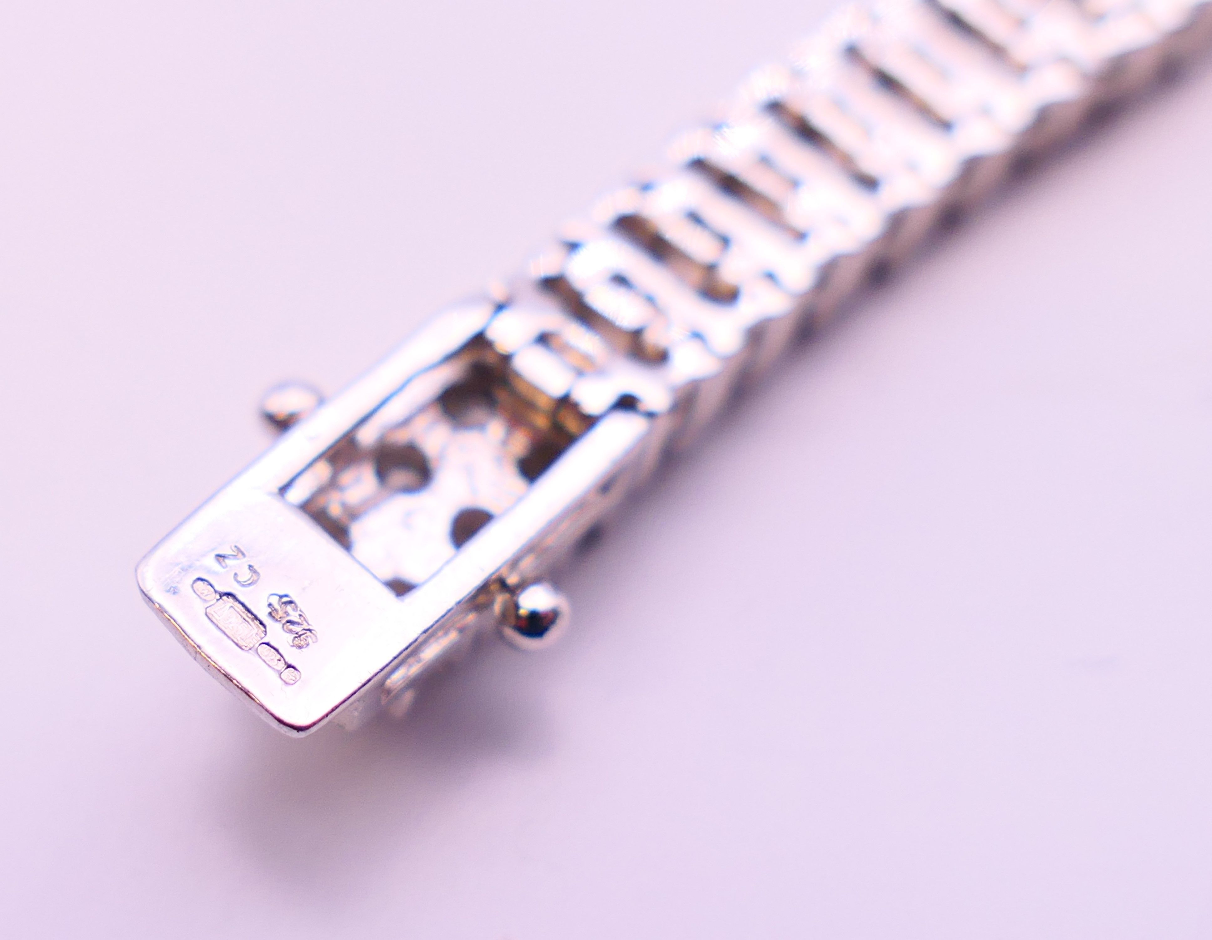 A silver cubic zirconia line bracelet. 20 cm long. - Image 5 of 5