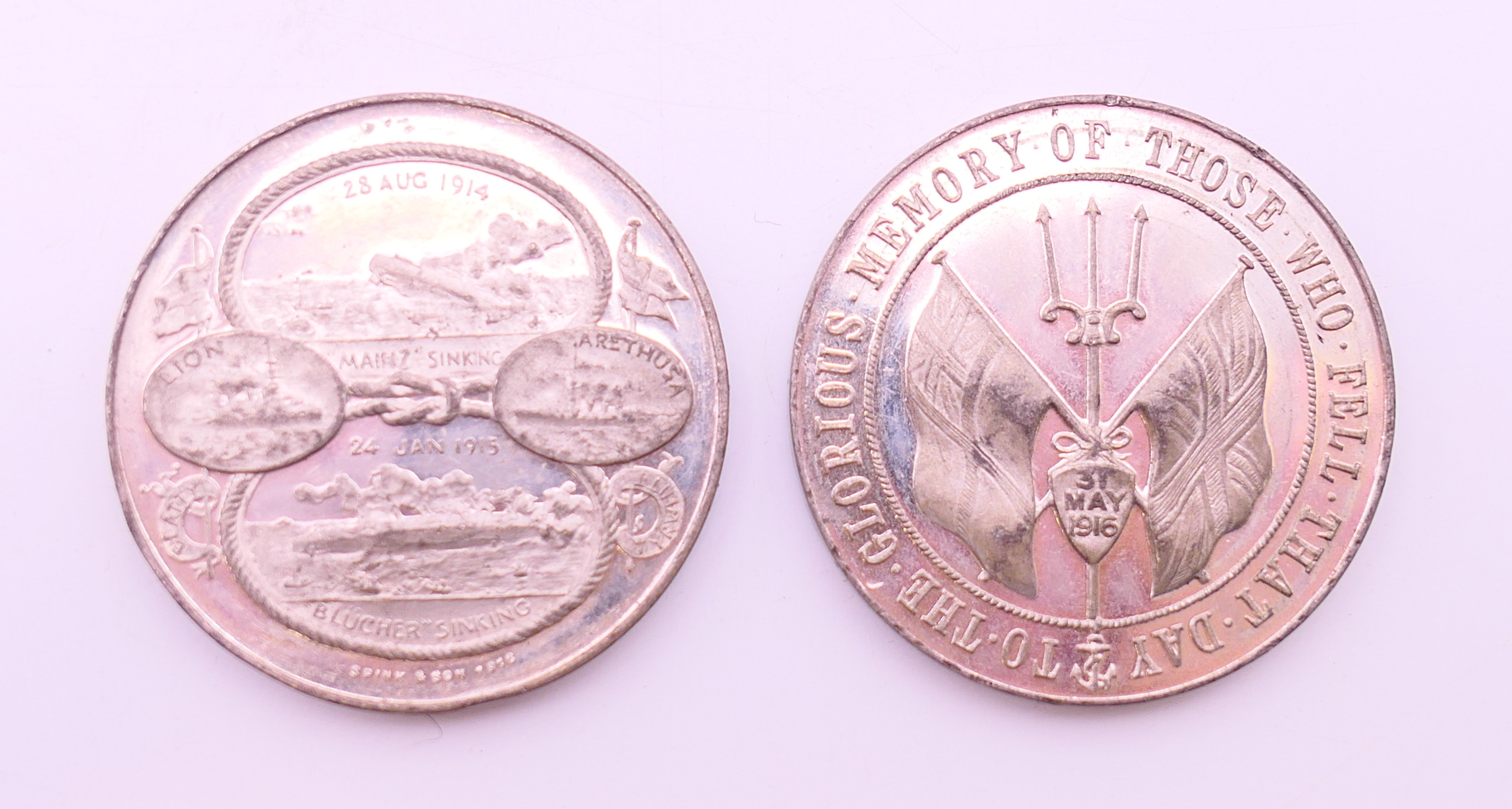 Two WWII naval medallions. Each 4.5 cm diameter.