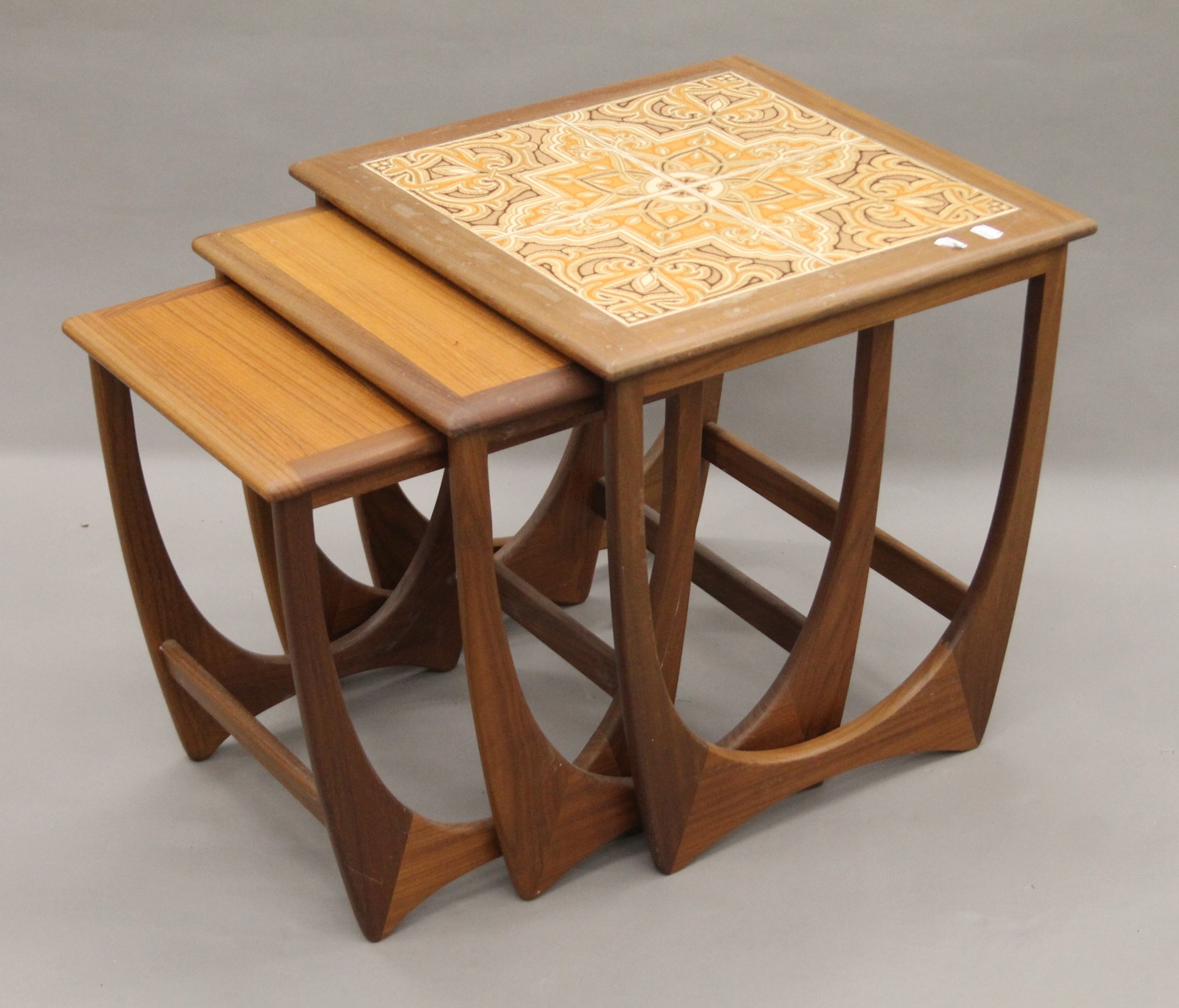 A mid-century G-Plan nest of three tables. The largest 49.5 cm wide.