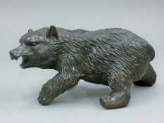 A bronze bear. 20 cm long.