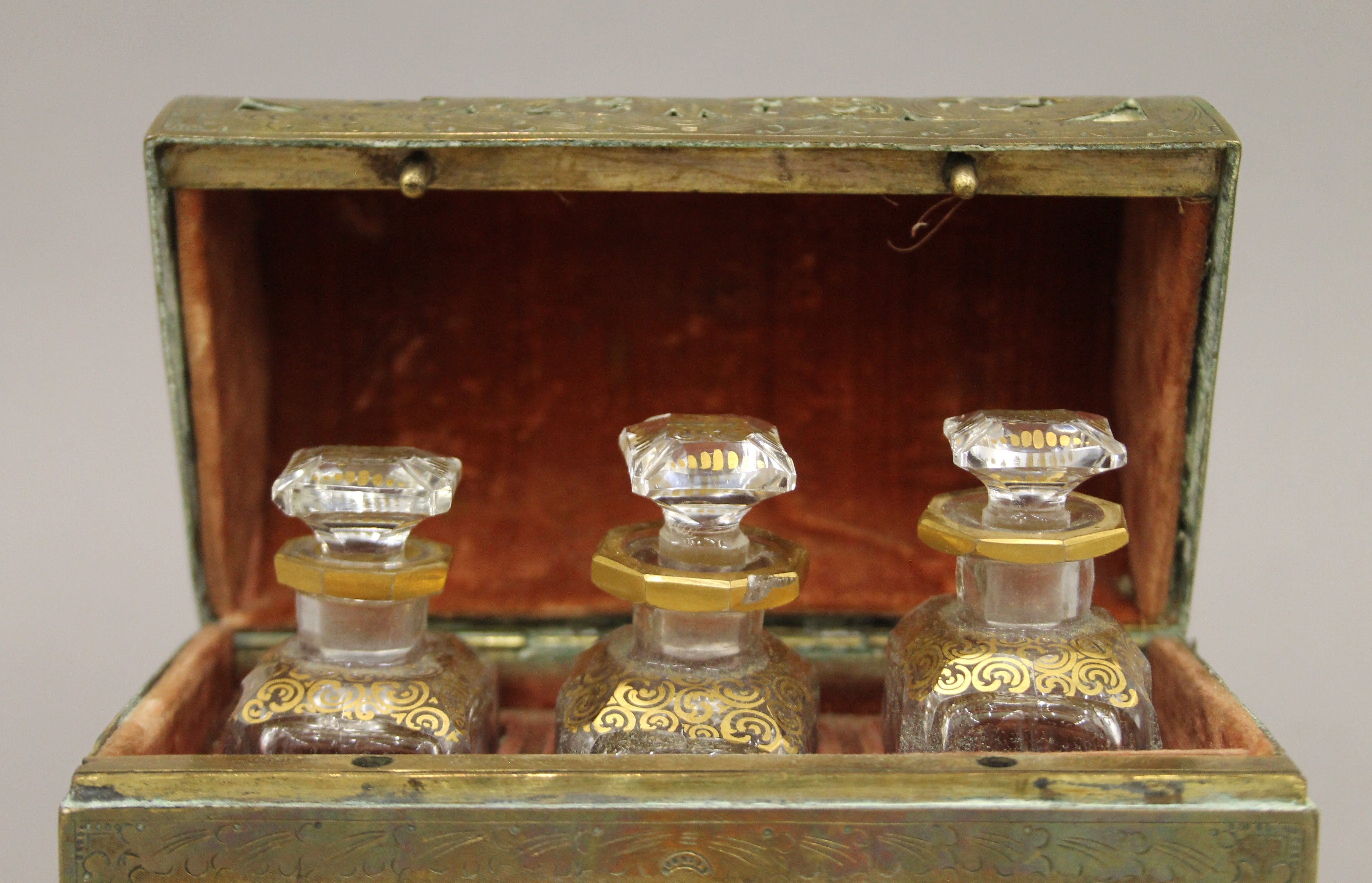 An antique dome-shaped pierced brass velvet-lined perfume casket containing three gilded cut glass - Image 4 of 6