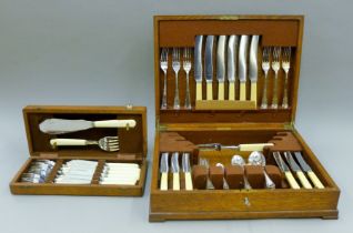 An oak-cased canteen of silver-plated cutlery and an oak case of plated fish cutlery.