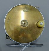 An early model of a 4" Hardy Bros Perfect fly reel with brass face and alloy frame.