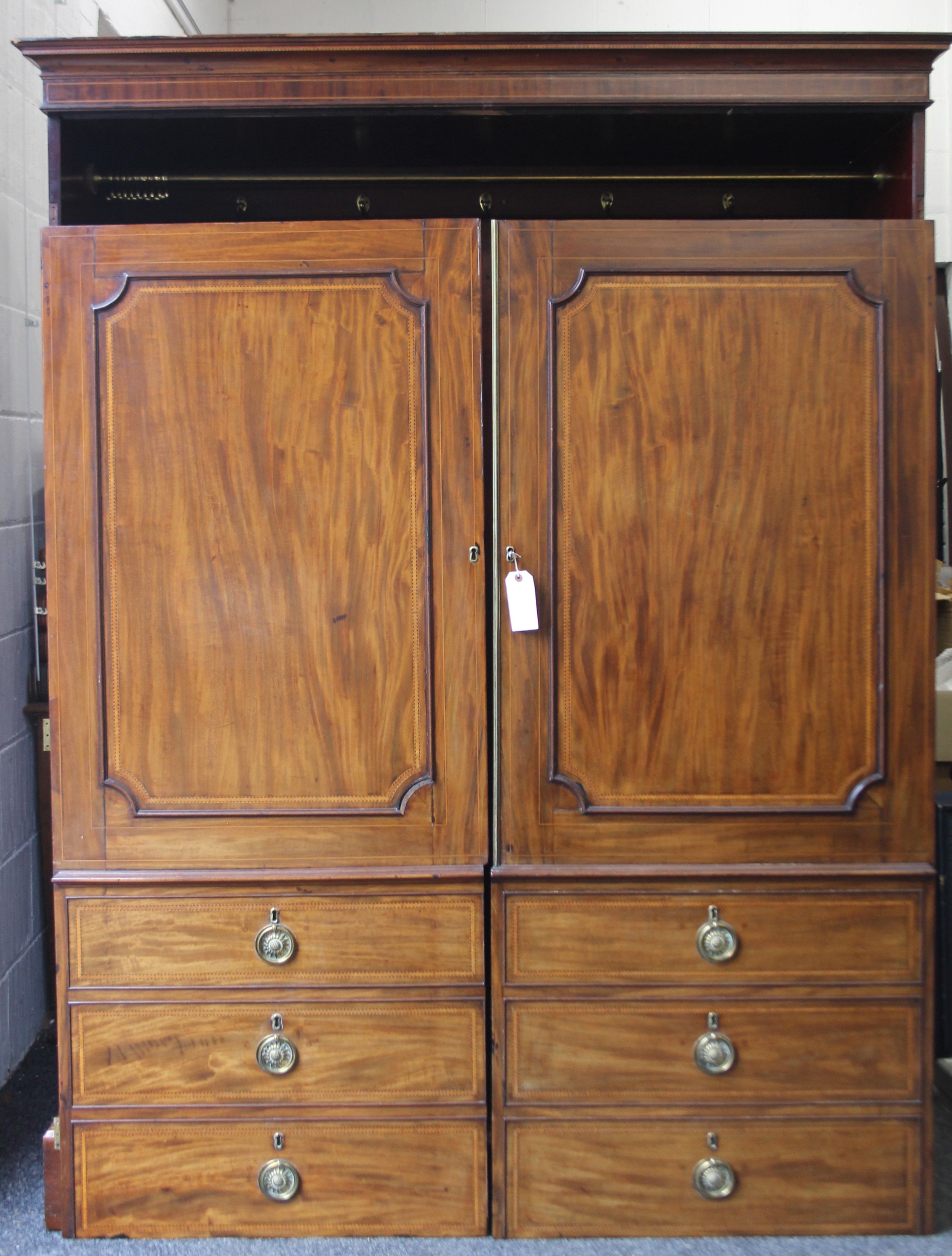 An Edwardian inlaid mahogany wardrobe. 150 cm wide x 194 cm high.