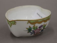 A small Herend Hungary pot decorated with butterfly and flowers. 8 cm long.