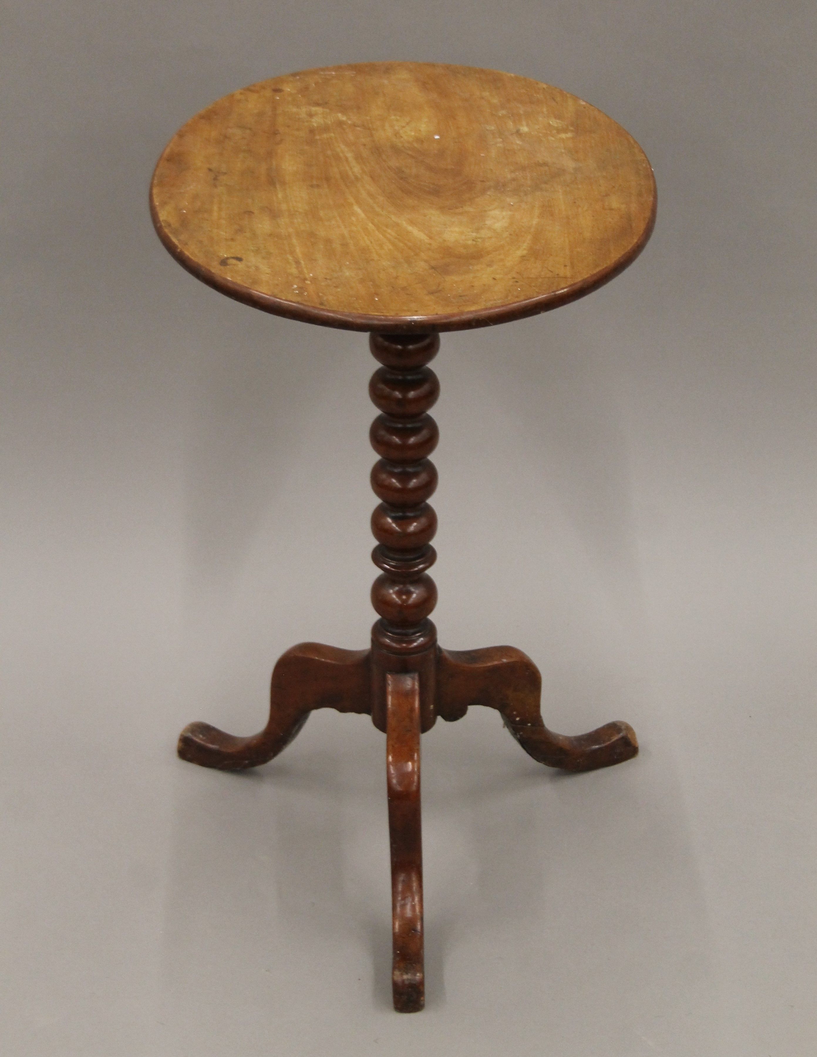 A 19th century mahogany tripod table. 66.5 cm high.