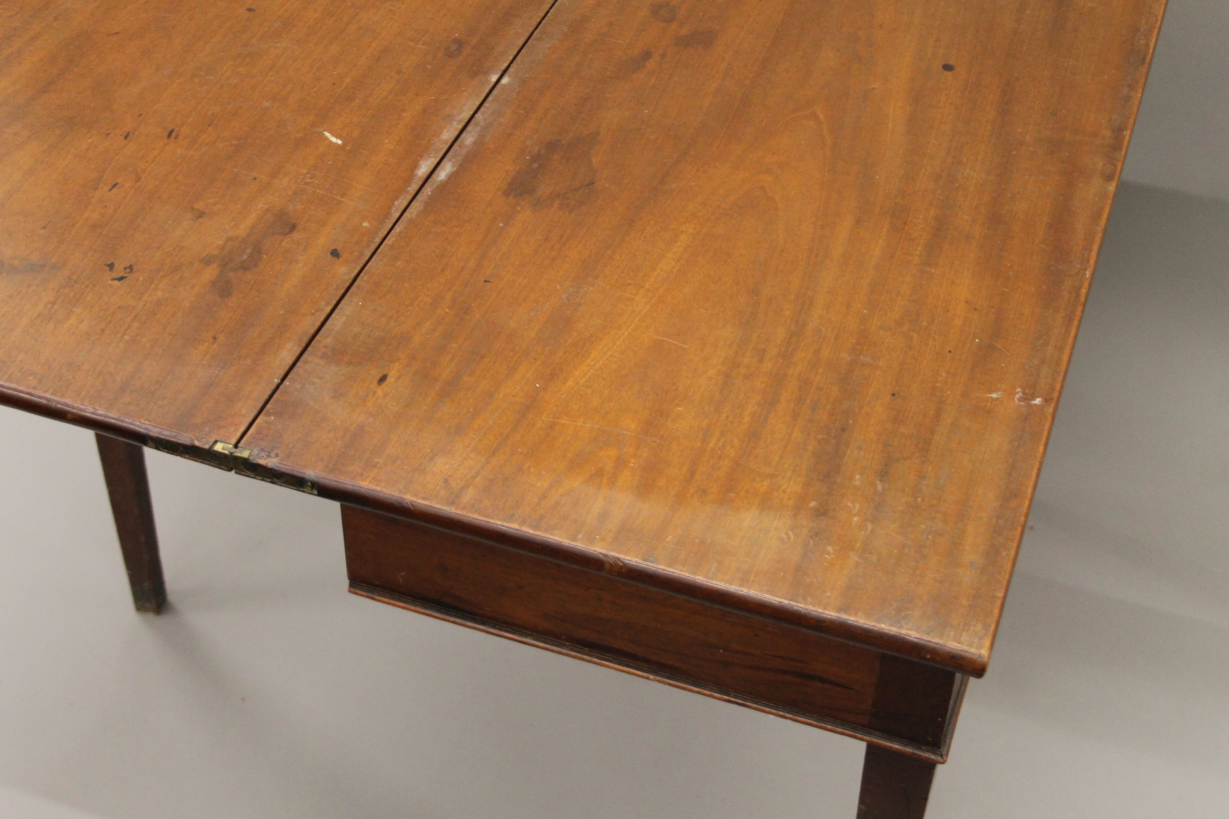 A 19th century mahogany fold-over tea table. 93.5 cm wide. - Image 4 of 5