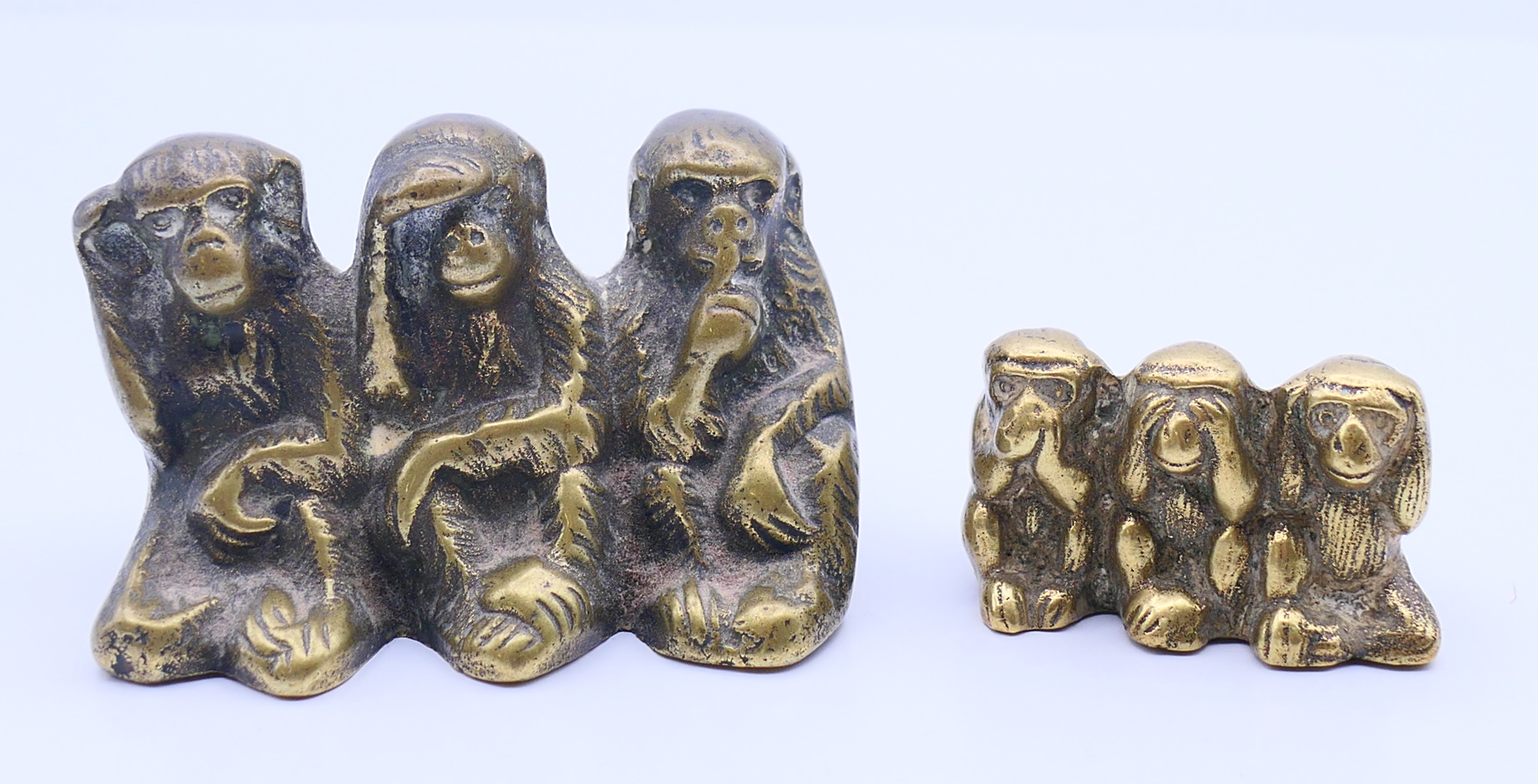 Two brass three wise monkey figures (Hear No Evil, See No Evil, Speak No Evil). Largest 7.