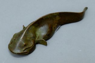 A bronze model of a catfish. 12 cm long.