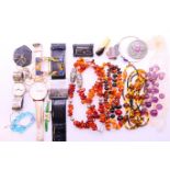 A bag of costume jewellery including amber and silver etc.