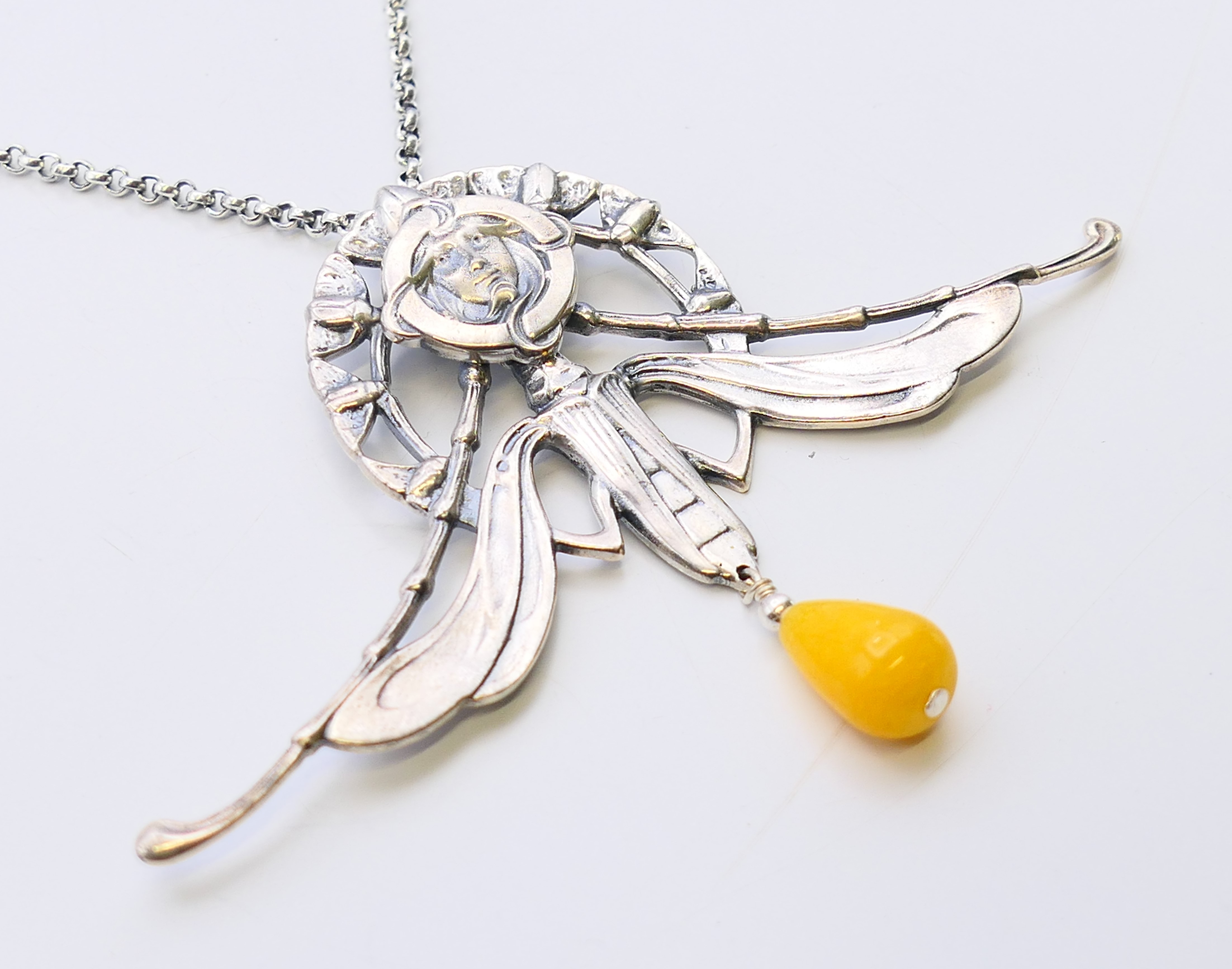 A silver Art Nouveau-style winged female head and bead pendant on a silver chain. - Image 2 of 6