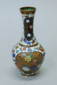 A small cloisonne vase. 15 cm high.