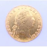 An 1802 gold half guinea. 4.2 grammes.