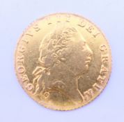 An 1802 gold half guinea. 4.2 grammes.