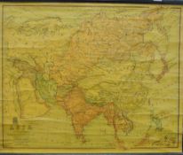 A vintage rolled map of Asia. 91 cm wide.