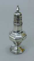 A silver sugar sifter. 14.5 cm high. 73.8 grammes.