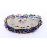 A Chinese silver, enamel and jade brooch. 5 cm x 2.5 cm.