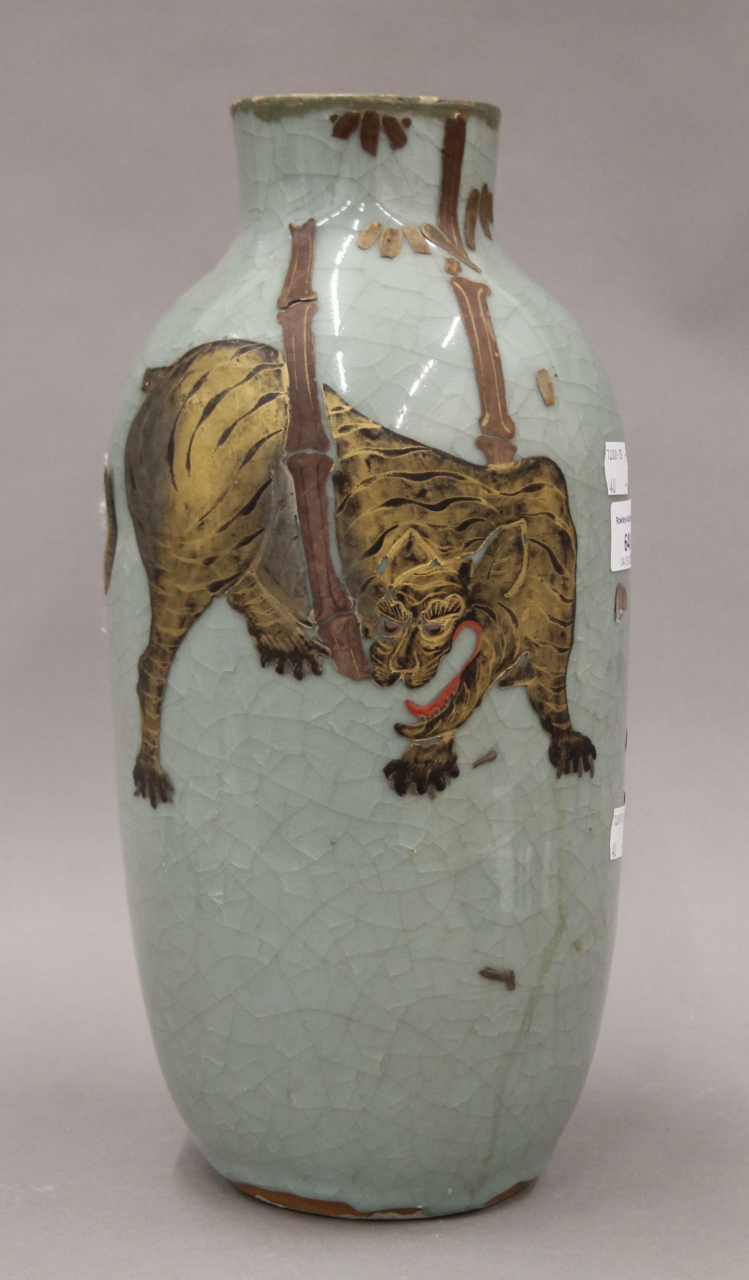 An Oriental celadon ground vase decorated with a tiger. 34 cm high. - Image 2 of 9