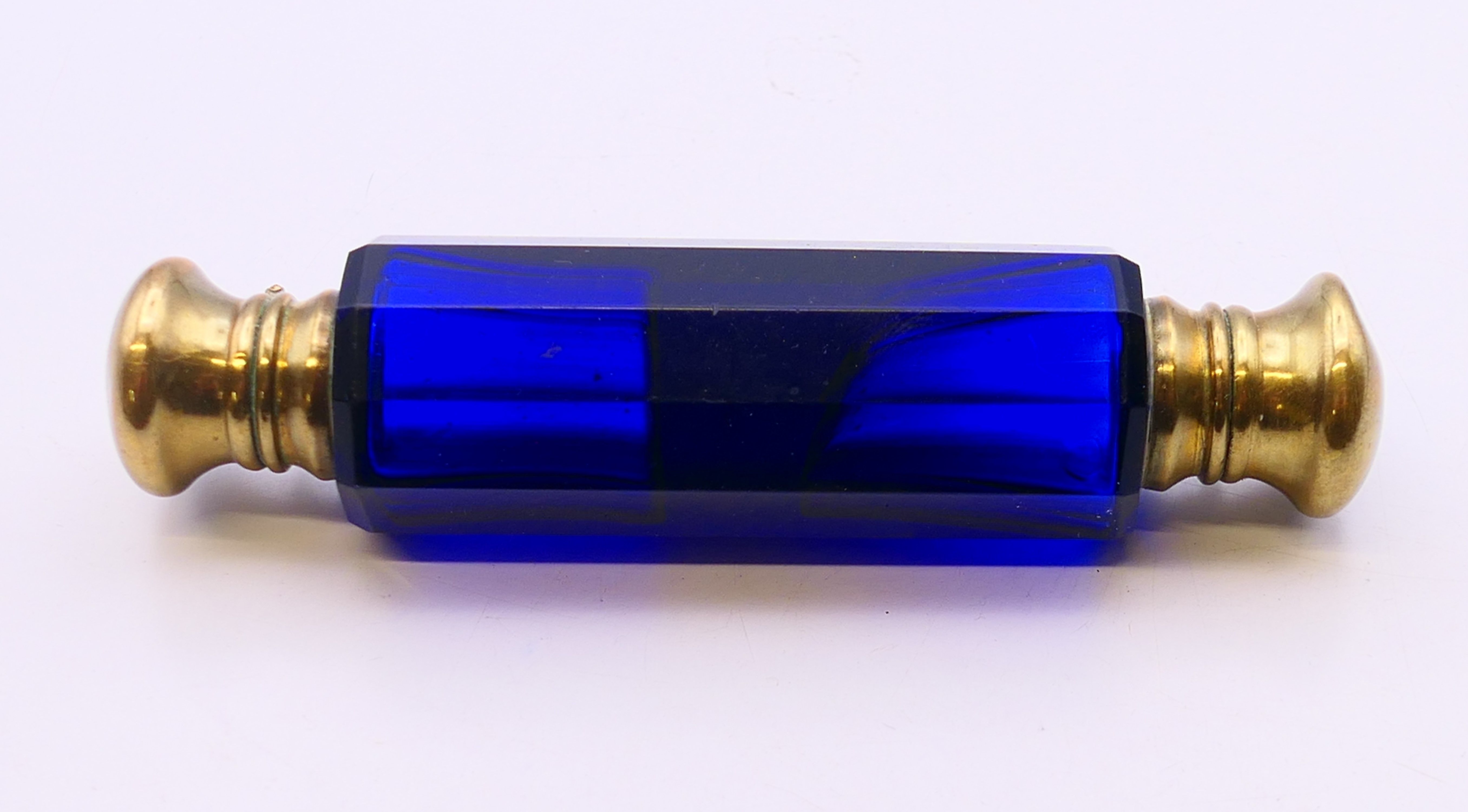 A Bristol blue double-ended scent bottle. 11 cm long.