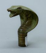 A bronze cobra's head walking stick handle. 10 cm high.