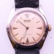 A 1952/53 Gentleman's Rolex Oyster wristwatch, on later strap, in a Rolex box. 3.5 cm wide.