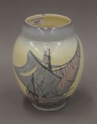 A Carlton Ware vase decorated with ships. 19 cm high.