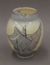 A Carlton Ware vase decorated with ships. 19 cm high.