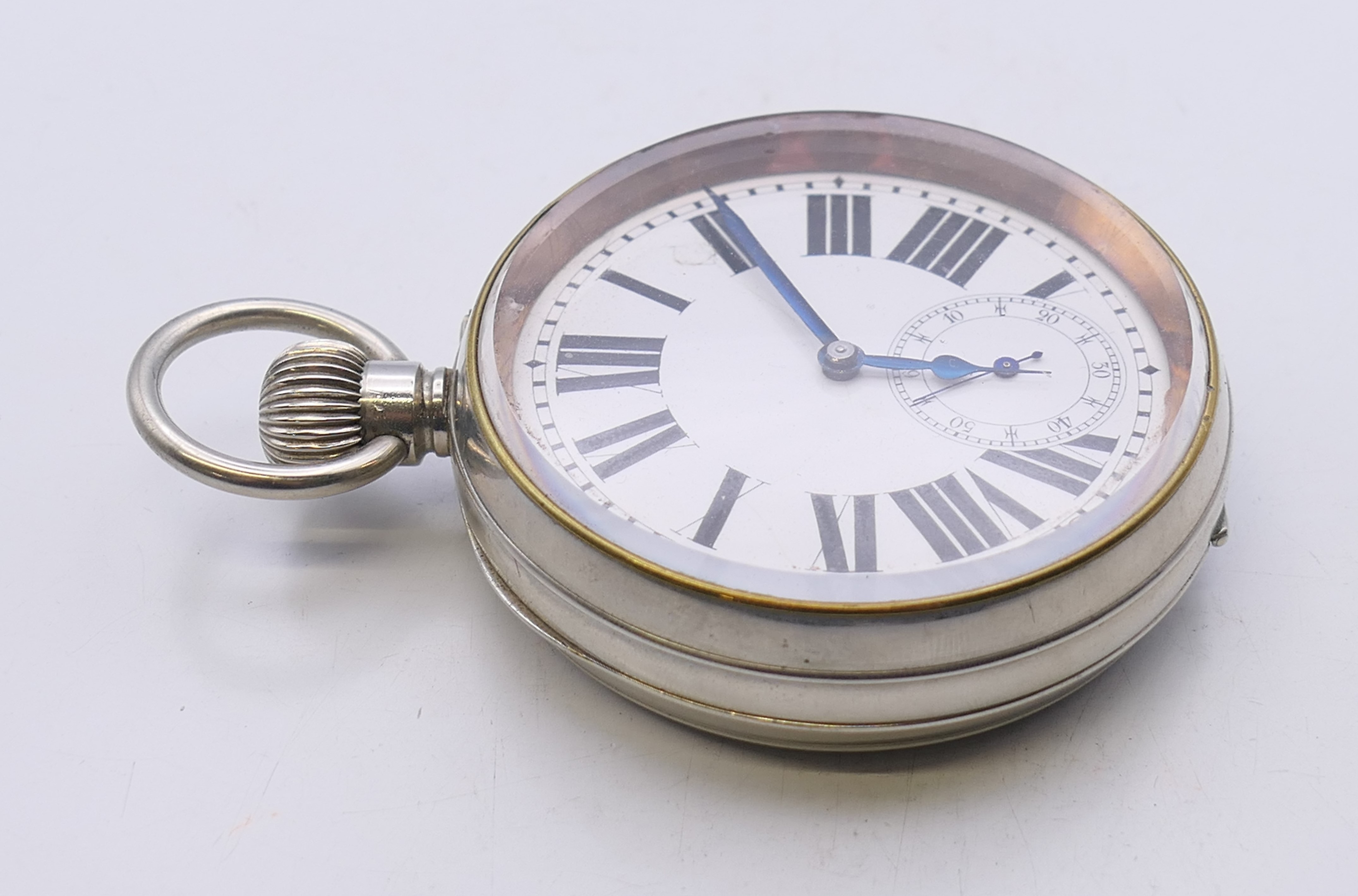 A Swiss silver plated Goliath pocket watch, housed in a silver-clad travelling case. - Image 5 of 9