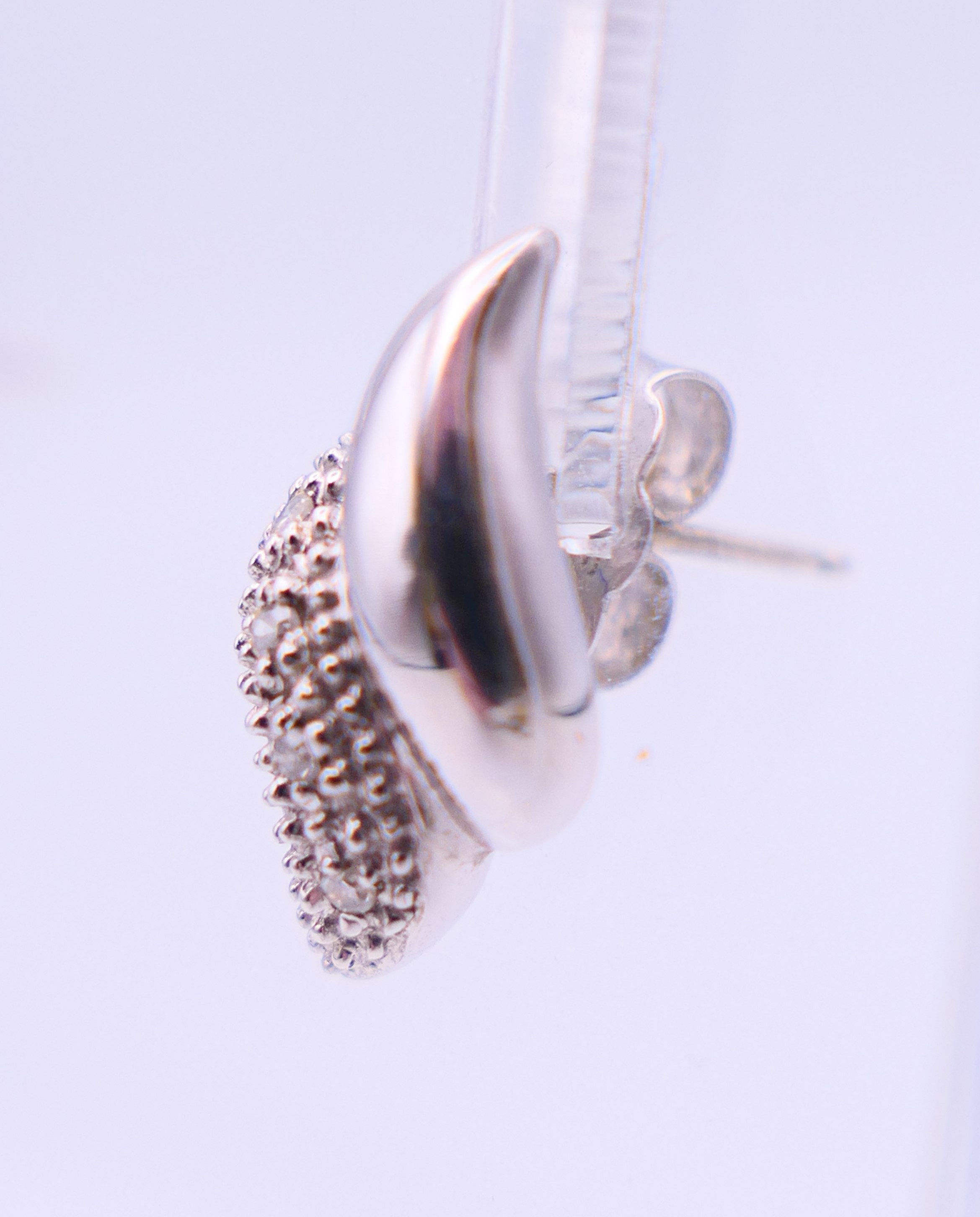 An 18 ct white gold and diamond pendant on an 18 ct white gold chain and a pair of 9 ct gold and - Image 10 of 13
