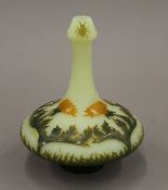 A French acid-etched cameo glass vase of squat shape, the bottle neck decorated with two beetles,