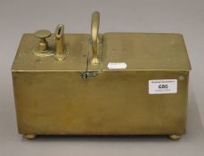 A 19th century brass penny honesty tobacco box. 24 cm long.