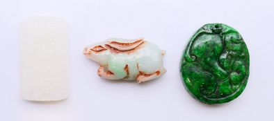 Three jade carvings. each 5 cm high.