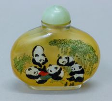 A large Chinese snuff bottle decorated with pandas. 10.5 cm wide.