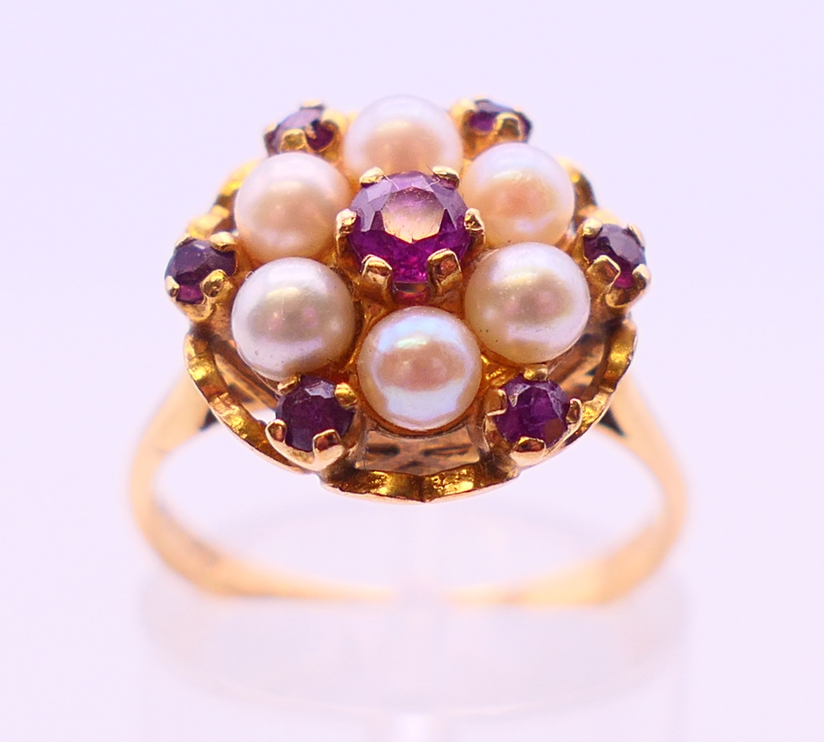 A 9 ct gold, pearl and ruby cluster ring. Ring size M. - Image 2 of 8