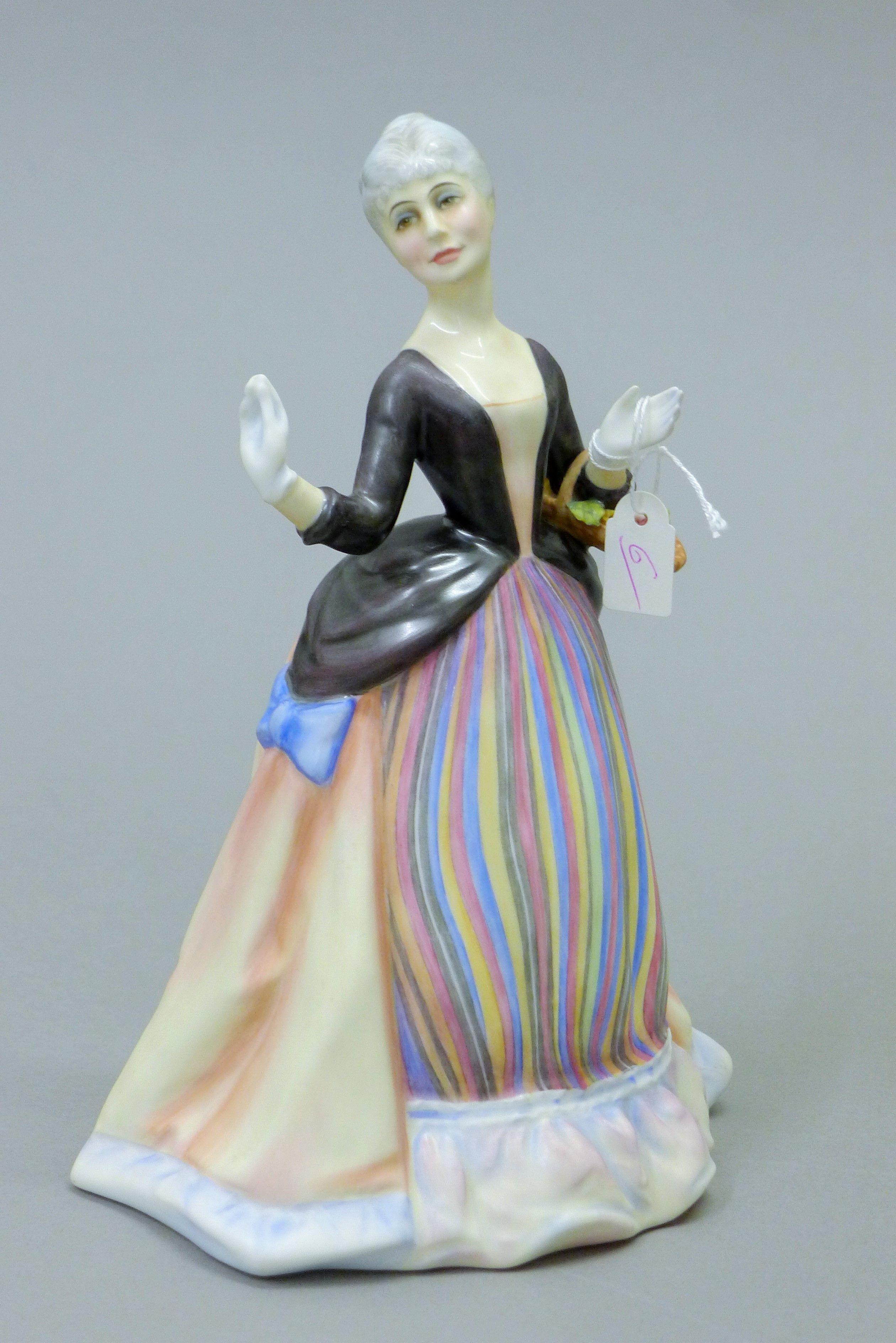 A Royal Doulton figurine, Flower Arranging, HN3040. 22 cm high. - Image 2 of 5