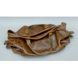 A vintage leather bag. 53 cms long.