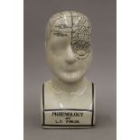 A phrenology head. 23.5 cm high.
