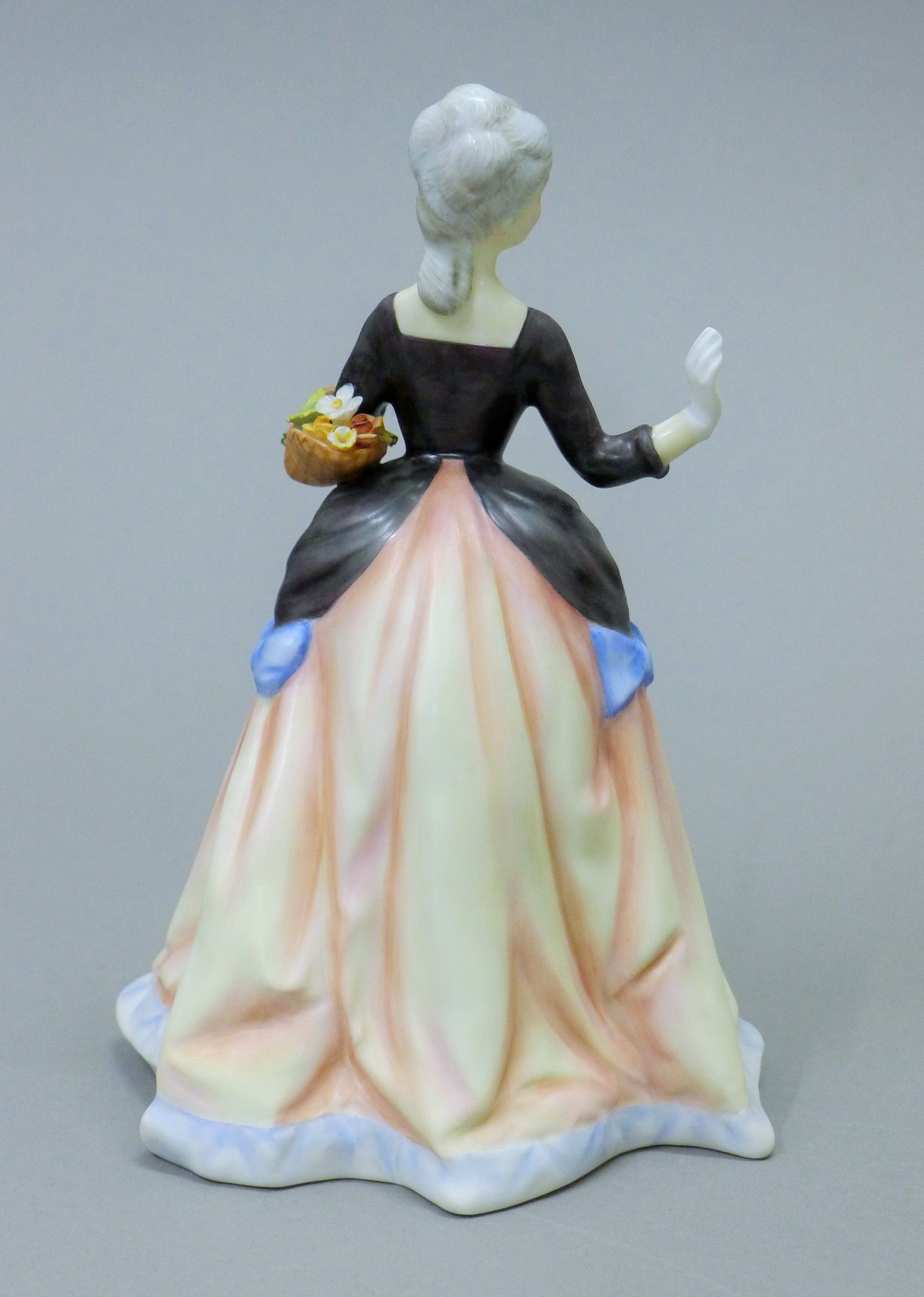 A Royal Doulton figurine, Flower Arranging, HN3040. 22 cm high. - Image 3 of 5