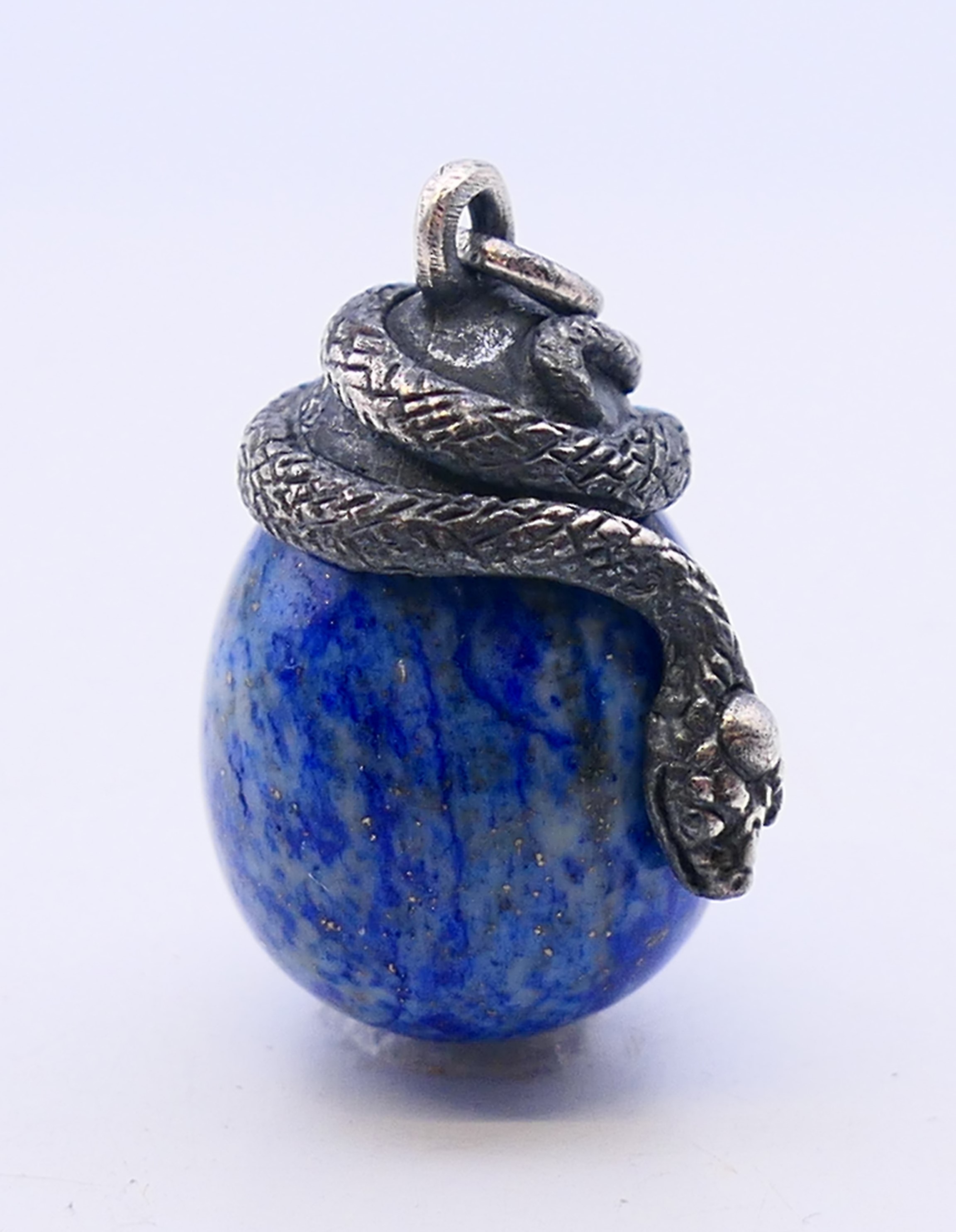 A silver and lapiz egg and snake pendant. 2.5 cm high. - Image 2 of 4