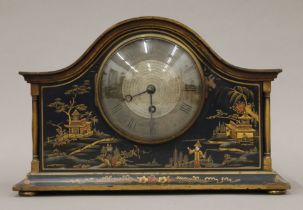 A late 19th century mantle clock with hand-painted wood chinoiserie case. 32 cm wide.