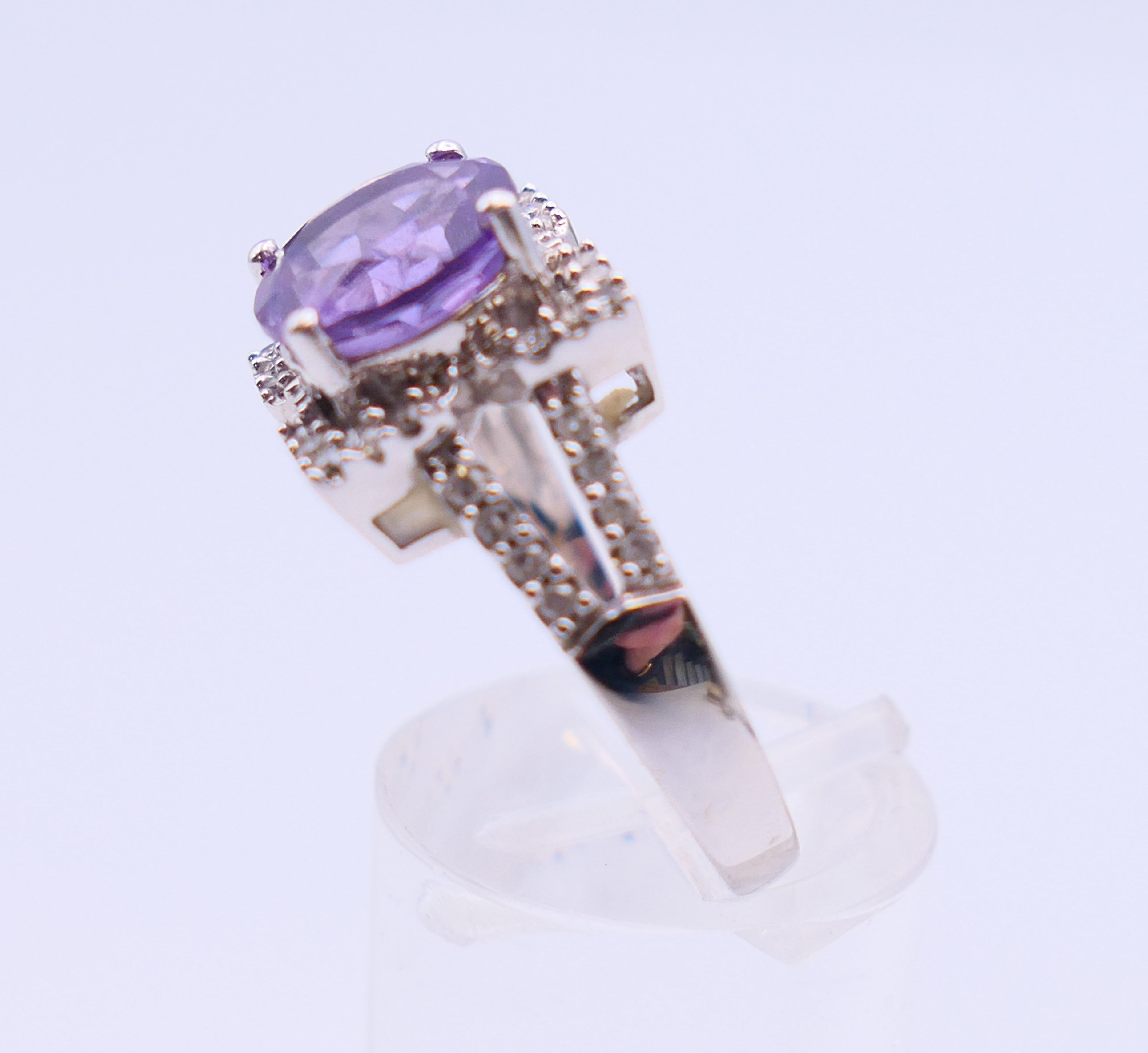 A 9 ct white gold, amethyst and diamond ring. 4.4 grammes. Ring size Q/R. - Image 3 of 5