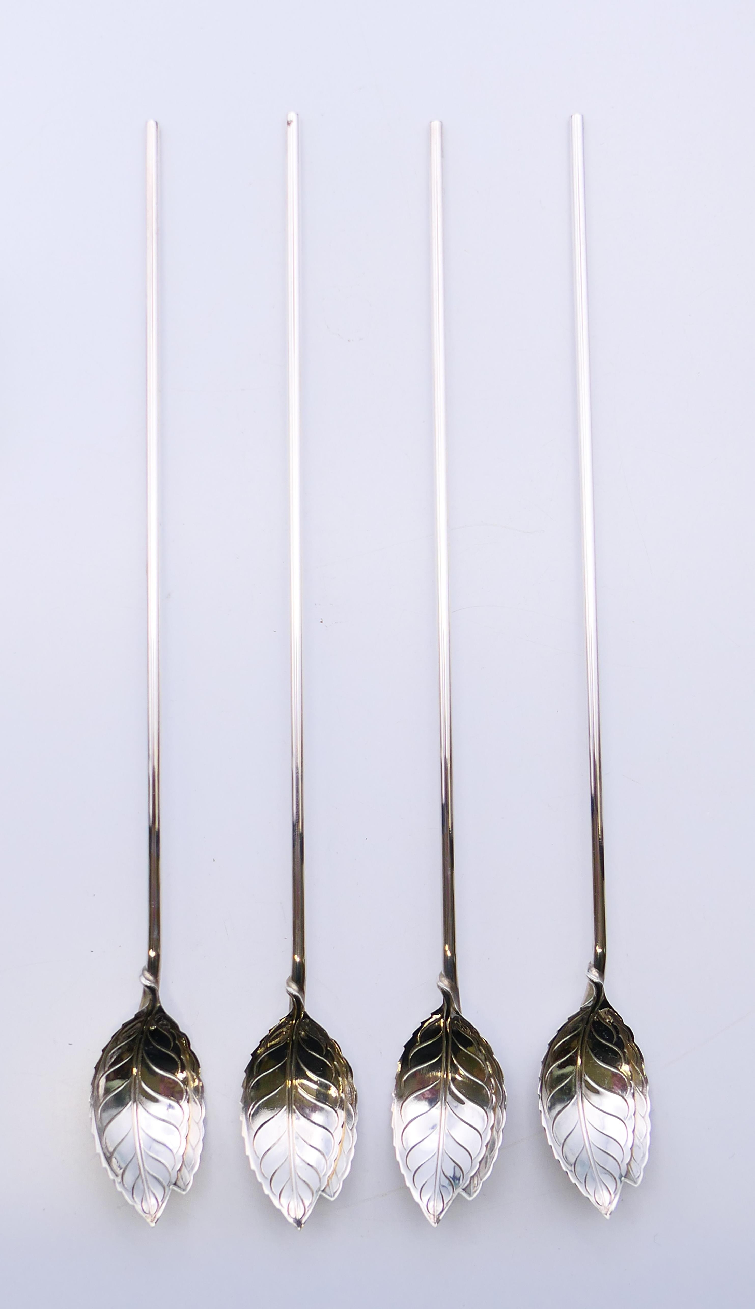 Four boxed Tiffany and Co silver cocoa spoons. 21.5 cm high. - Image 2 of 7