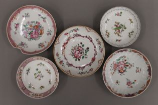 A collection of five 18th century porcelain dishes including New Hall. The largest 16 cm diameter.